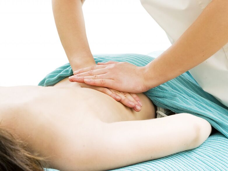 Massagem para dor na região lombar